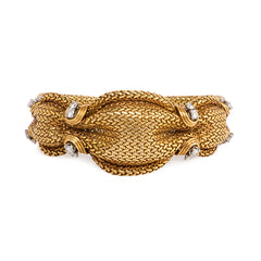 Mid-Century woven gold and diamond bracelet, France.