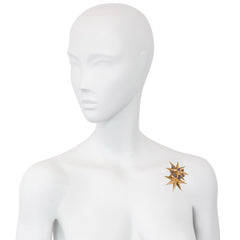 Pair of Retro gold star brooches, Cartier
