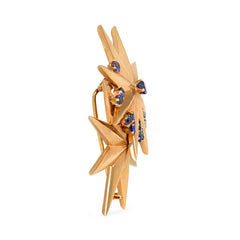 Pair of Retro gold star brooches, Cartier