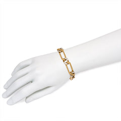 Gold and diamond curblink bracelet. Van Cleef & Arpels