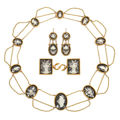 Georgian carved bone, ebony, and gold demi-parure