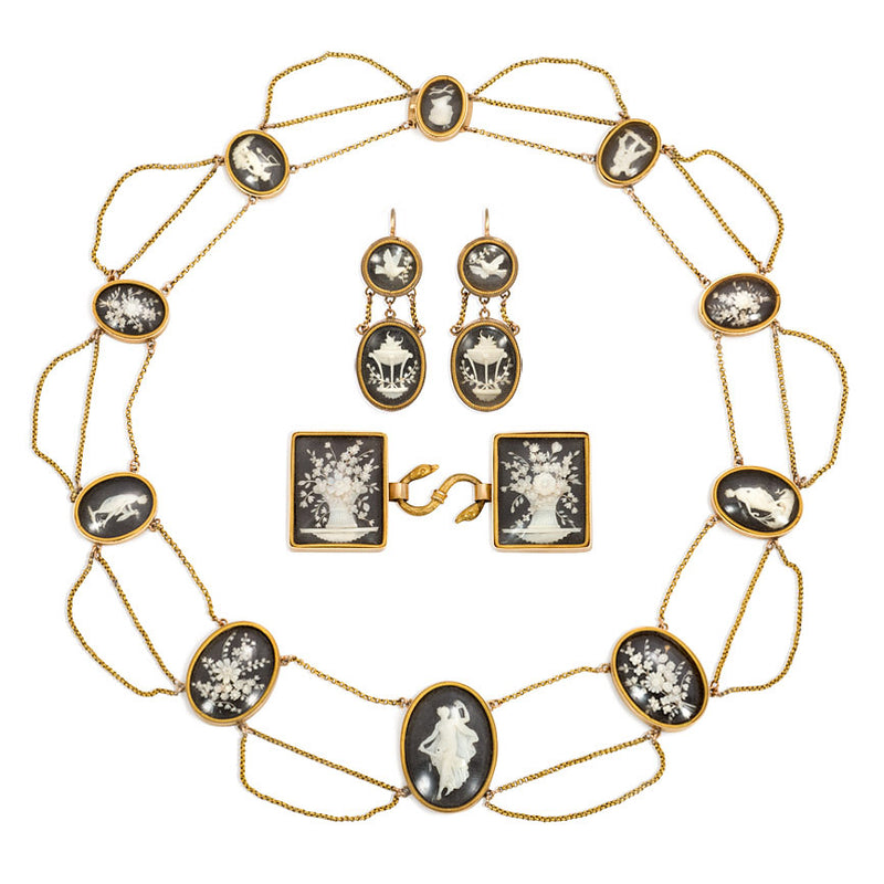 Georgian carved bone, ebony, and gold demi-parure