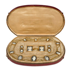 Georgian carved bone, ebony, and gold demi-parure