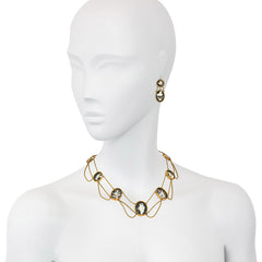 Georgian carved bone, ebony, and gold demi-parure