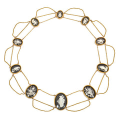 Georgian carved bone, ebony, and gold demi-parure