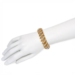 Gold and diamond "flamme" bracelet, Van Cleef & Arpels, Paris