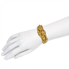 Retro three-row gold gaspipe bracelet, France