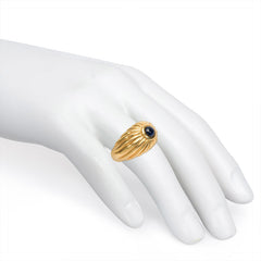 Gold ribbed bombé sapphire ring, Cartier