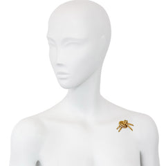 Gold knot brooch, Hermès