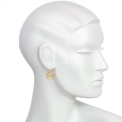 Antique gold, pearl, and diamond horseshoe motif earrings