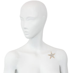 French Retro gold and diamond star brooch