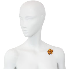 Retro gold, citrine, and diamond mechanical flower brooch