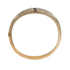 Three antique French diamond, gold, and gem-set bangles