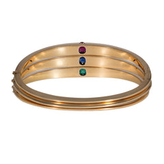 Three antique French diamond, gold, and gem-set bangles