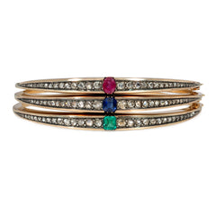Three antique French diamond, gold, and gem-set bangles