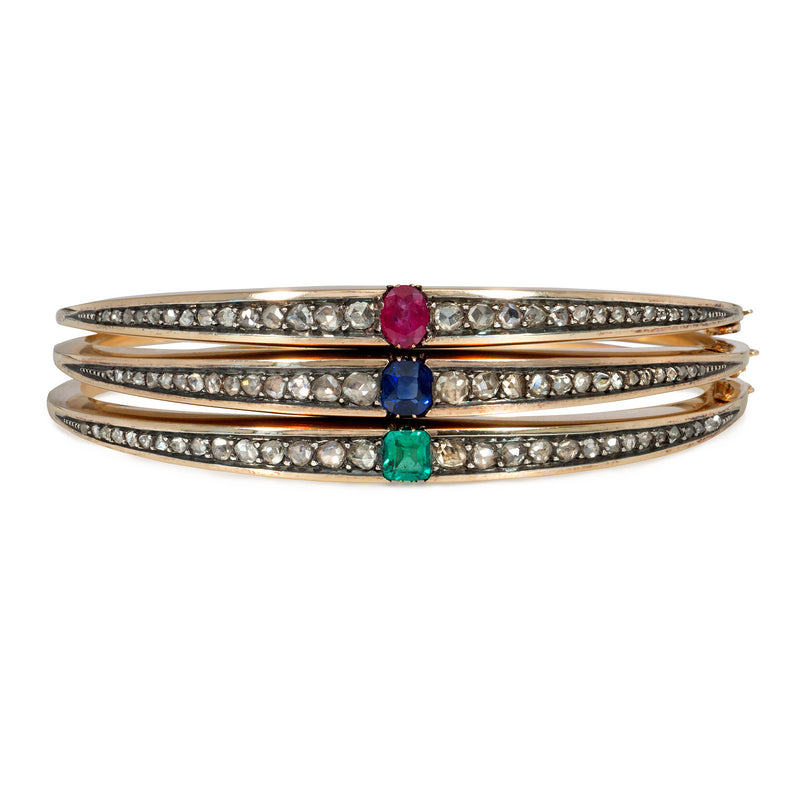 Three antique French diamond, gold, and gem-set bangles