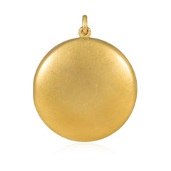 Antique round gold and diamond locket