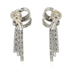 French day-to-night diamond loop and tassel earrings