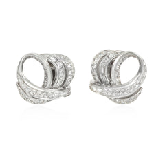 French day-to-night diamond loop and tassel earrings