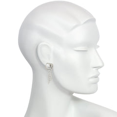 French day-to-night diamond loop and tassel earrings