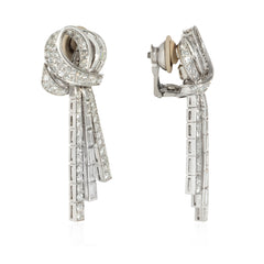 French day-to-night diamond loop and tassel earrings