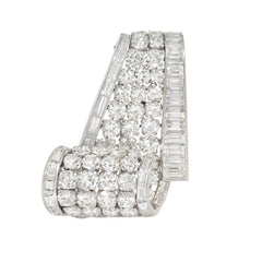 Cartier, Paris diamond and platinum graduated scroll brooch