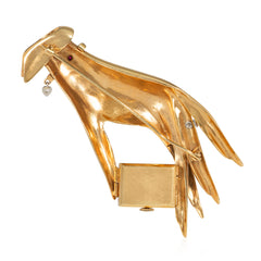 Retro Flato gold, ruby, and diamond hand brooch watch