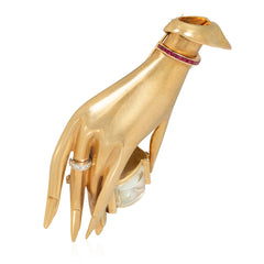 Retro Flato gold, ruby, and diamond hand brooch watch