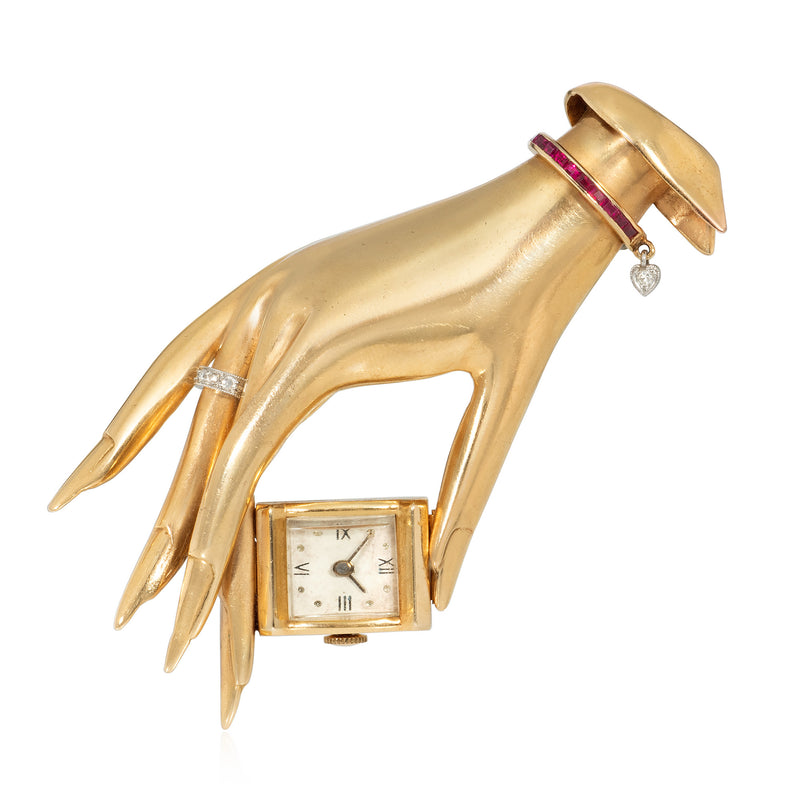 Retro Flato gold, ruby, and diamond hand brooch watch