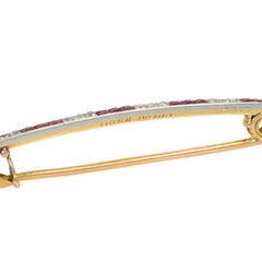 Lacloche, Paris Edwardian diamond, ruby, and gold safety pin brooch