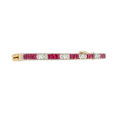 Lacloche, Paris Edwardian diamond, ruby, and gold safety pin brooch