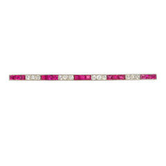 Lacloche, Paris Edwardian diamond, ruby, and gold safety pin brooch