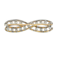An Art Deco enamel and diamond infinity brooch