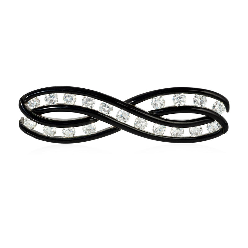 An Art Deco enamel and diamond infinity brooch