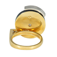Onyx, gold and diamond spinner ring