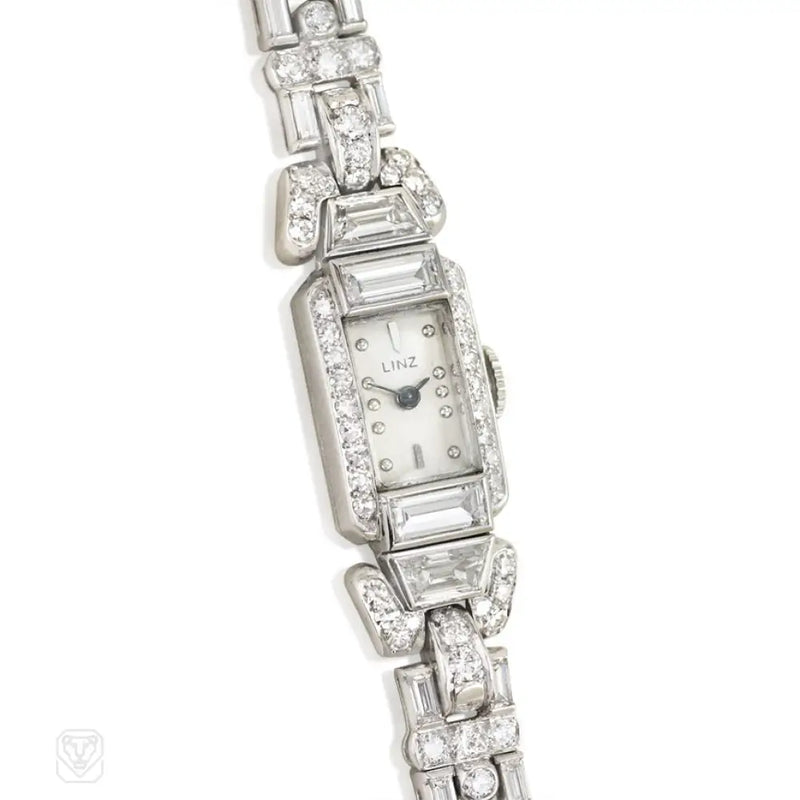 A Diamond Bracelet Watch With Geometric Links Set Roun...