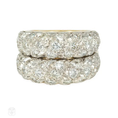 A pair of French gold, platinum, and diamond twist rings for Neiman Marcus