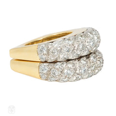 A pair of French gold, platinum, and diamond twist rings for Neiman Marcus