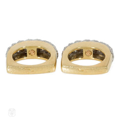 A pair of French gold, platinum, and diamond twist rings for Neiman Marcus
