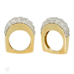 A pair of French gold, platinum, and diamond twist rings for Neiman Marcus