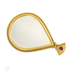 A Retro gold and ruby mirror, Cartier.