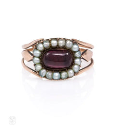 An antique half pearl and garnet cluster ring, in 18k.