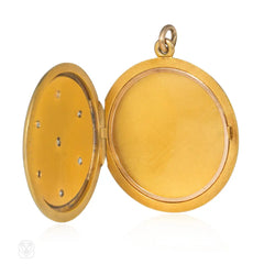 Antique diamond and gold round locket