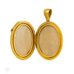 Antique gold and diamond buckle motif locket