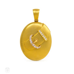 Antique gold and diamond buckle motif locket