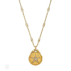 Antique gold and diamond star locket and chain
