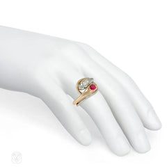 Antique gold and platinum double snake ring with ruby and diamond