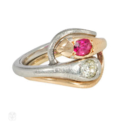 Antique gold and platinum double snake ring with ruby and diamond