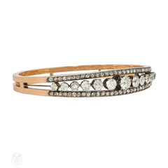 Antique graduated diamond and rose gold half-hoop bracelet