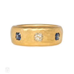 Antique hammered gold three-stone ring
